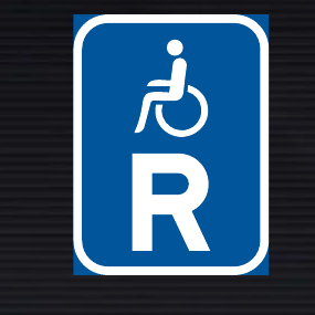 R323 Reserved for Vehicles Carrying Disabled Passengers Sign