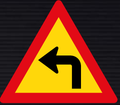 TW205 Sharp Curve Left Sign – Temporary