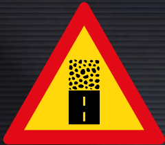 TW325 Gravel Road Begins Ahead Sign – Temporary
