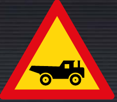 TW344 Construction Vehicle Crossing from the Left Sign – Temporary