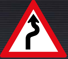 W208 Winding Road Right to Left Sign