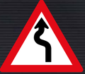 W209 Winding Road Left to Right Sign