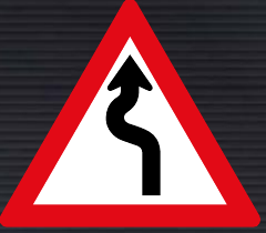 W209 Winding Road Left to Right Sign