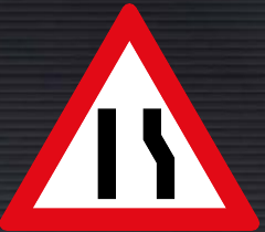 W329 Road Narrows from Right Side Sign