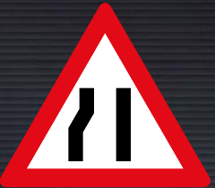 W330 Road Narrows from Left Side Sign