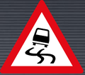 W333 Slippery Road Sign